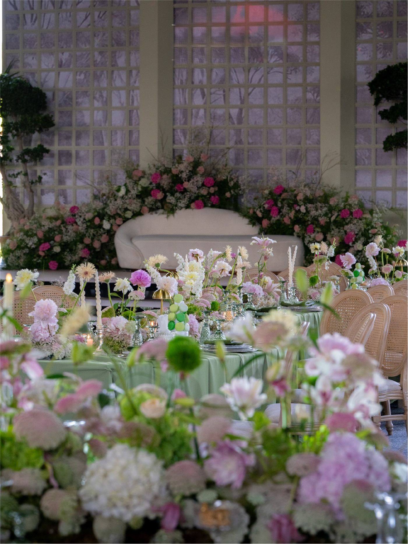White floral arch at a prestige wedding by DARSANA Events in Morocco