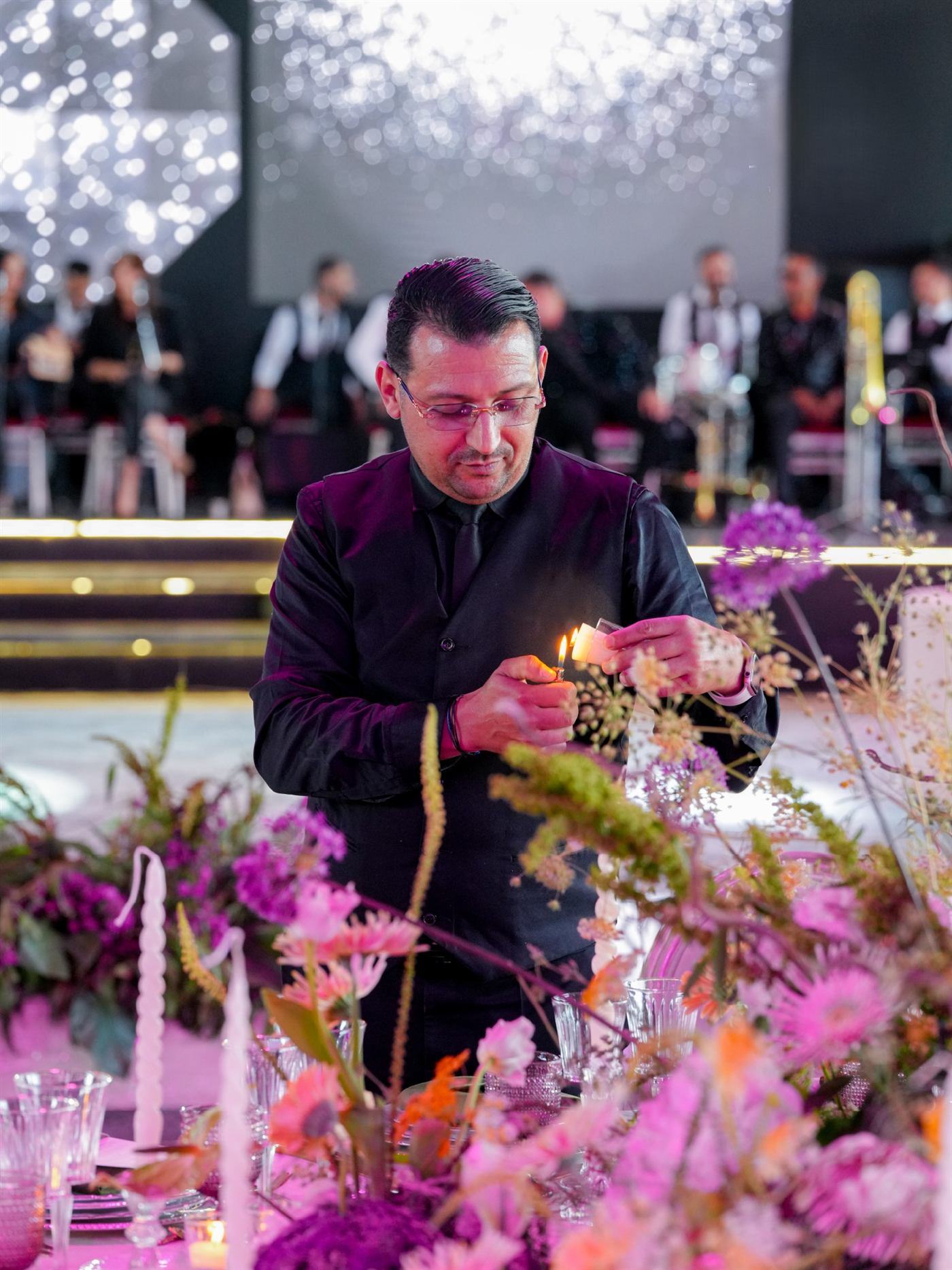 Lighting candles before guests arrive