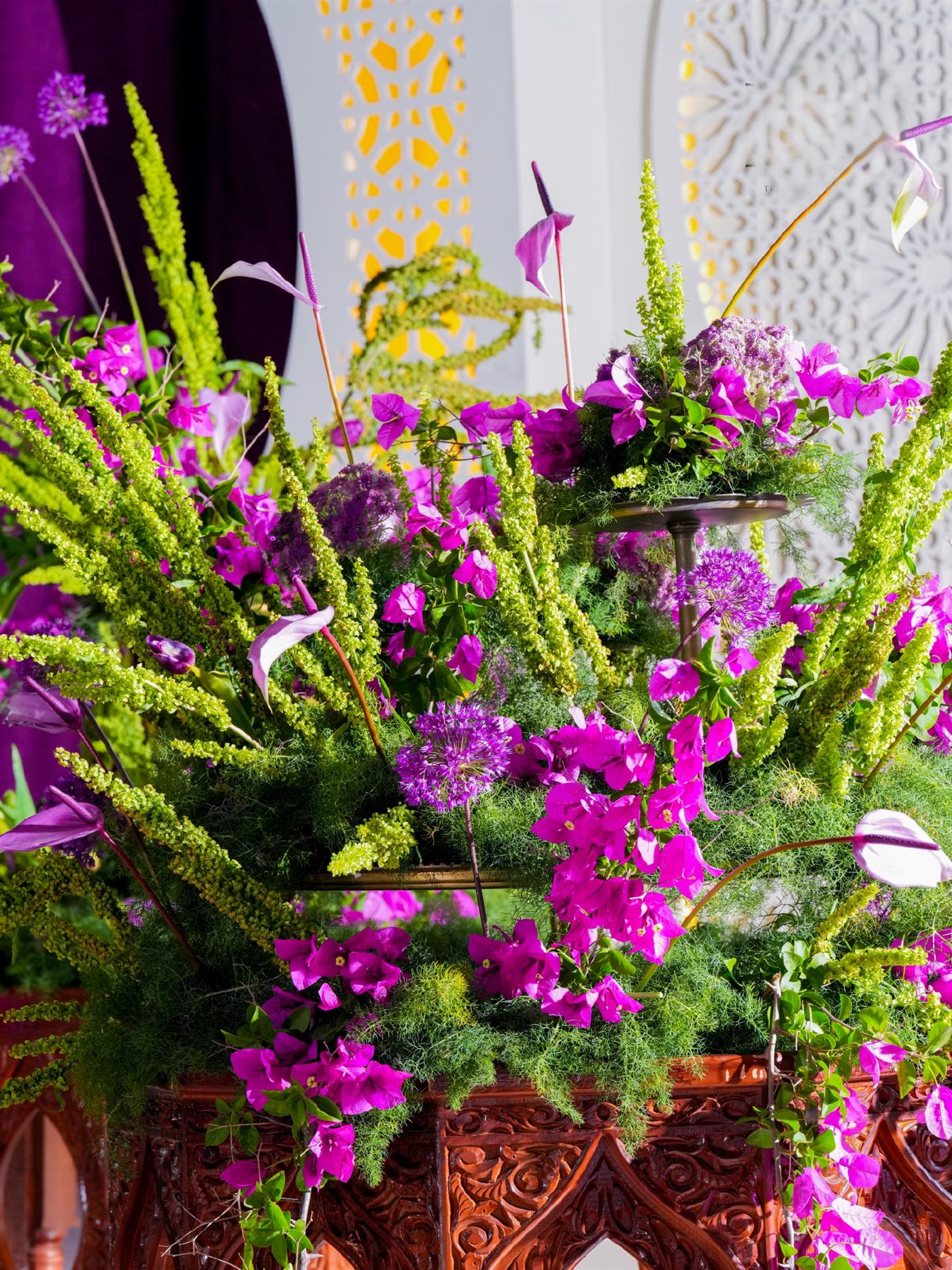 Fuchsia floral design with greenery